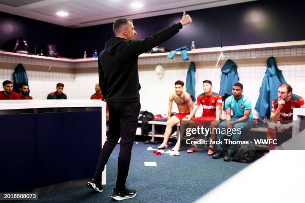 Gary O'Neil, head coach of Wolverhampton Wanderers speaks with the players in the dressing room following victory in the Premier League match between...