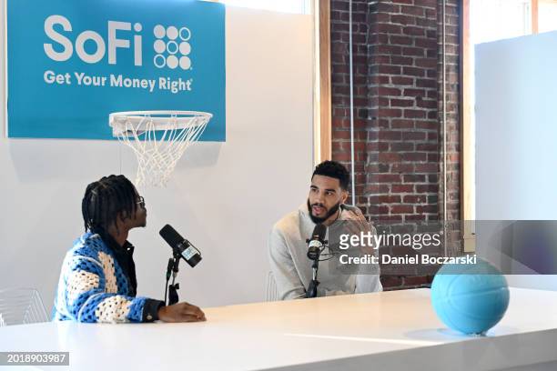 Kenny Beecham and Jayson Tatum record a podcast during the SoFi NBA All-Star Weekend VIP pre-party on February 17, 2024 in Indianapolis, Indiana.