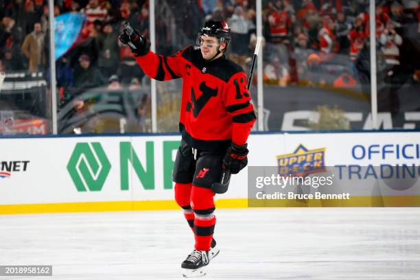 Nico Hischier of the New Jersey Devils celebrates after scoring a goal against the Philadelphia Flyers during the first period during the 2024 Navy...