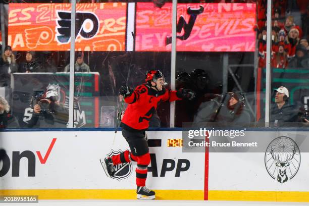 Nico Hischier of the New Jersey Devils celebrates after scoring a goal against the Philadelphia Flyers during the first period during the 2024 Navy...