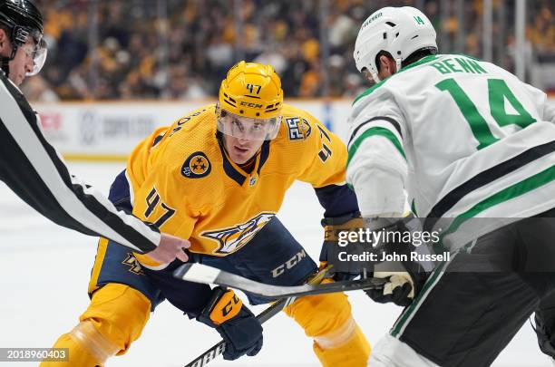 Michael McCarron of the Nashville Predators faces off against the Dallas Stars during an NHL game at Bridgestone Arena on February 15, 2024 in...