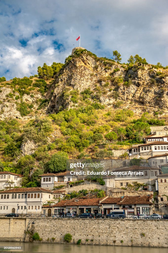 Traditional Albanian stone houses on the cliff of a mountain