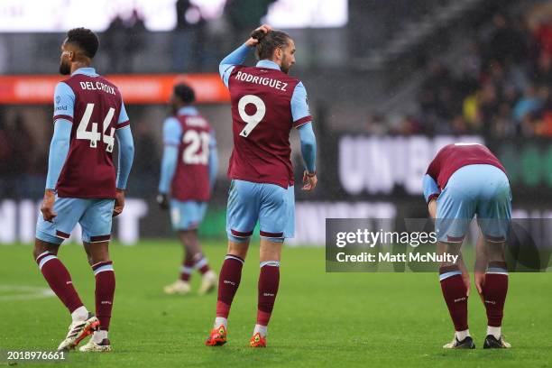 Jay Rodriguez of Burnley and teammates react after conceding the teams fifth goal during the Premier League match between Burnley FC and Arsenal FC...