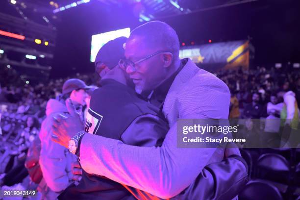 Cent and Dominique Wilkins meet on the court during the State Farm All-Star Saturday Night at Lucas Oil Stadium on February 17, 2024 in Indianapolis,...