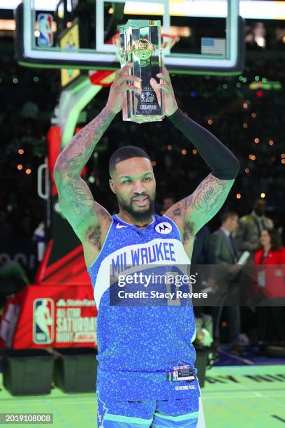 Damian Lillard of the Milwaukee Bucks celebrates after winning the 2024 Starry 3-Point Contest during the State Farm All-Star Saturday Night at Lucas...