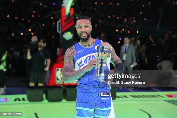 Damian Lillard of the Milwaukee Bucks poses for a photo after winning the 2024 Starry 3-Point Contest during the State Farm All-Star Saturday Night...