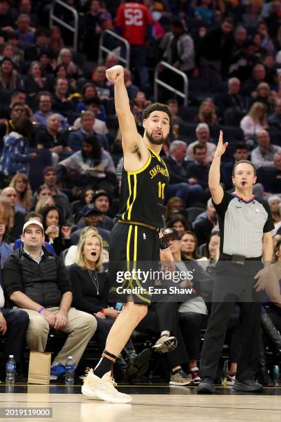 Klay Thompson of the Golden State Warriors watches his shot against the LA Clippers at Chase Center on February 14, 2024 in San Francisco,...