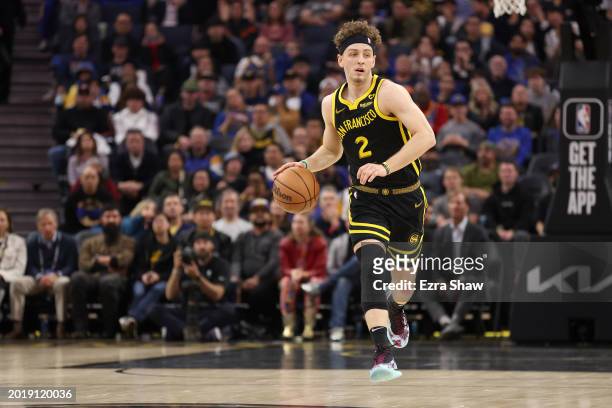 Brandin Podziemski of the Golden State Warriors dribbles the ball against the LA Clippers at Chase Center on February 14, 2024 in San Francisco,...