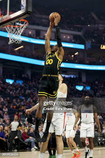 Jonathan Kuminga of the Golden State Warriors goes up for a dunk against the LA Clippers at Chase Center on February 14, 2024 in San Francisco,...