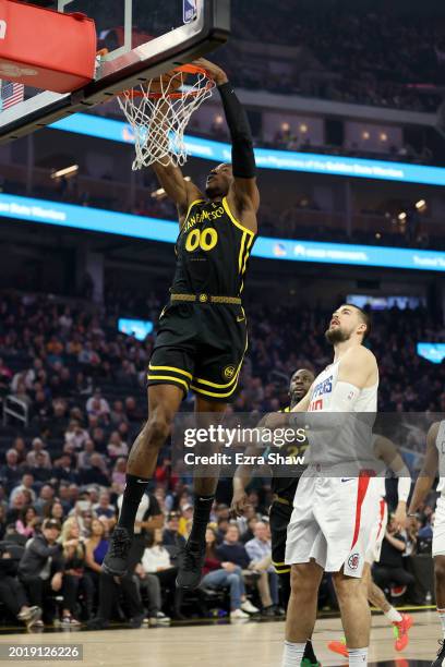 Jonathan Kuminga of the Golden State Warriors goes up for a dunk against the LA Clippers at Chase Center on February 14, 2024 in San Francisco,...