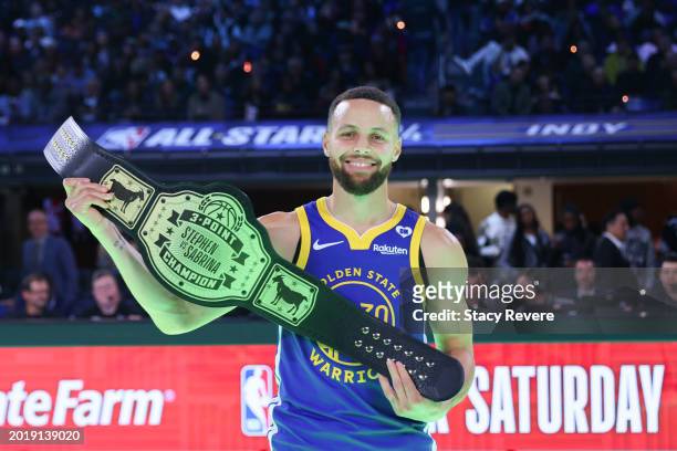 Stephen Curry of the Golden State Warriors celebrates after defeating Sabrina Ionescu of the New York Liberty in a 3-point challengeduring the State...