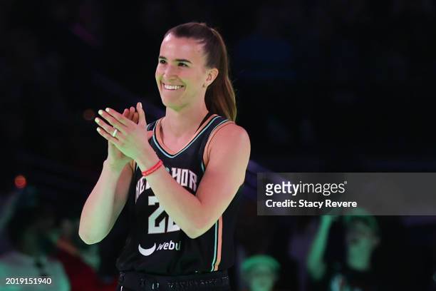 Sabrina Ionescu of the New York Liberty reacts during a 3-point challenge against Stephen Curry of the Golden State Warriors during the State Farm...