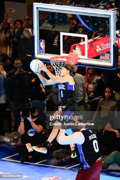 Mac McClung of the Osceola Magic participates in the 2024 AT&T Slam Dunk contest during the State Farm All-Star Saturday Night at Lucas Oil Stadium...