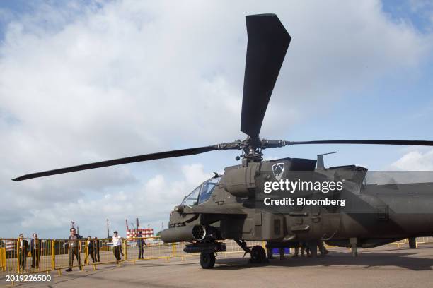 Air Force AH-64E Apache multi-role combat helicopter, manufactured by Boeing Co., on display during the Singapore Airshow in Singapore, on Wednesday,...