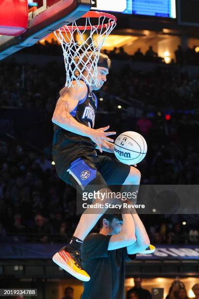 Mac McClung of the Osceola Magic participates in the 2024 AT&T Slam Dunk contest during the State Farm All-Star Saturday Night at Lucas Oil Stadium...