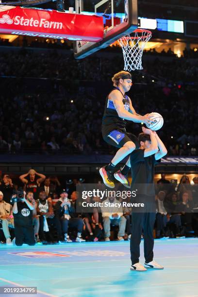 Mac McClung of the Osceola Magic participates in the 2024 AT&T Slam Dunk contest during the State Farm All-Star Saturday Night at Lucas Oil Stadium...