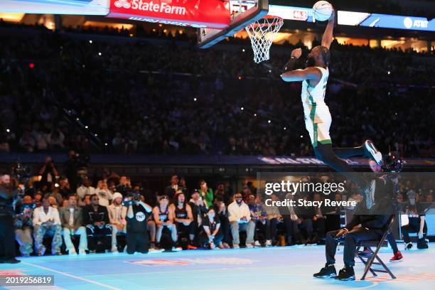 Jaylen Brown of the Boston Celtics participates in the 2024 AT&T Slam Dunk contest during the State Farm All-Star Saturday Night at Lucas Oil Stadium...