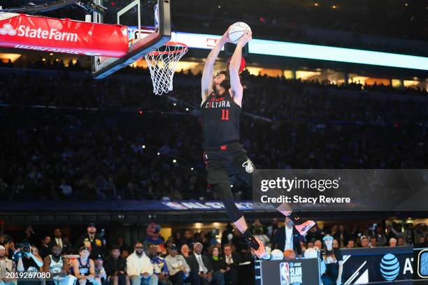 Jaime Jaquez Jr. #11 of the Miami Heat participates in the 2024 AT&T Slam Dunk Contest during the State Farm All-Star Saturday Night at Lucas Oil...