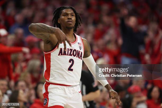 Caleb Love of the Arizona Wildcats reacts to a three-point shot against the Arizona State Sun Devils during the first half of the NCAAB game at...