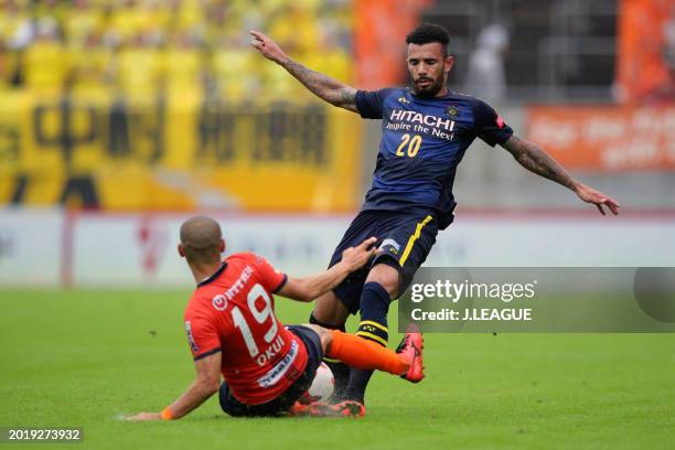 Ramon Lopes of Kashiwa Reysol and Ryo Okui of Omiya Ardija compete for the ball during the J.League J1 match between Omiya Ardija and Kashiwa Reysol...