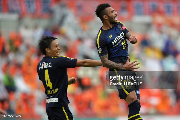 Ramon Lopes of Kashiwa Reysol celebrates with teammate Shinnosuke Nakatani after scoring the team's first goal during the J.League J1 match between...