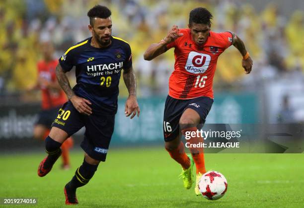 Mateus Castro of Omiya Ardija controls the ball against Ramon Lopes of Kashiwa Reysol during the J.League J1 match between Omiya Ardija and Kashiwa...