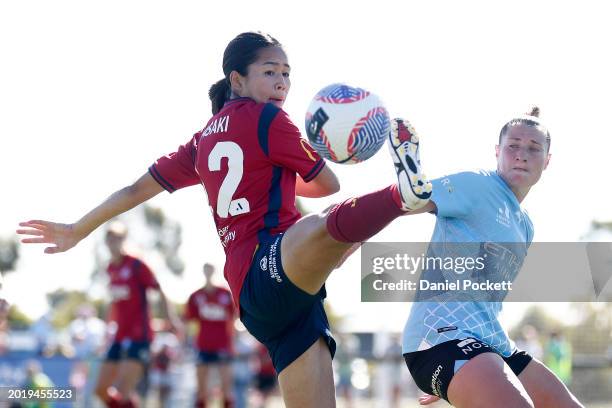 Nanako Sasaki of Adelaide United and Rhianna Pollicina of Melbourne City contest the ball during the A-League Women round 17 match between Melbourne...