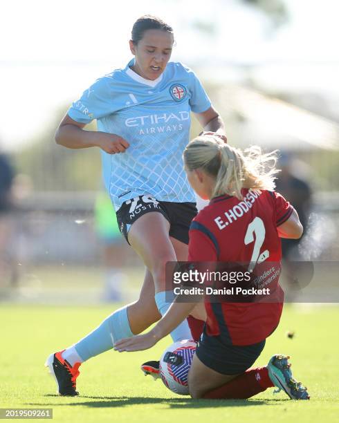 Emily Hodgson of Adelaide United defends a goal attempt from Daniela Galic of Melbourne City during the A-League Women round 17 match between...