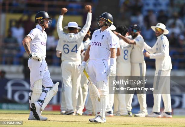 England batsman Joe Root reacts after been given out lbw to Ravindra Jadeja after a review as captain Ben Stokes looks on during day four of the 3rd...