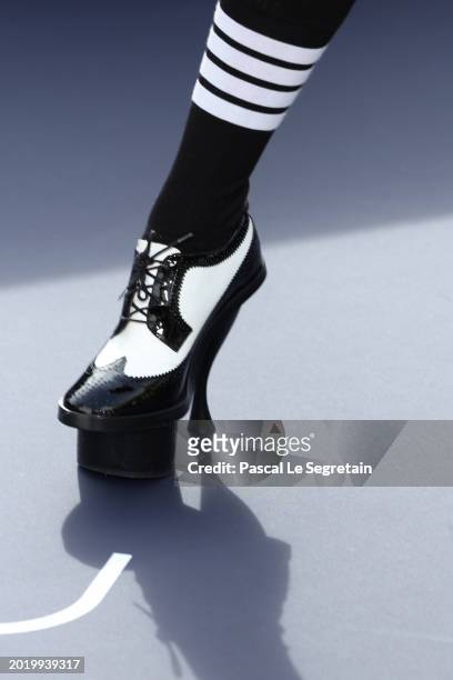 Rebecca Ferguson, shoe detail, attends the "Dune 2" Photocall at Shangri La Hotel on February 12, 2024 in Paris, France.
