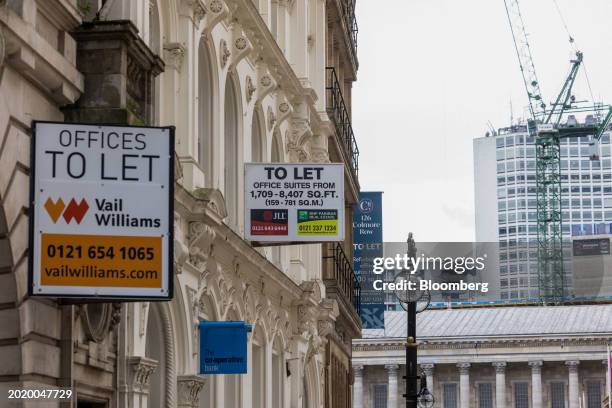 Estate agents "To Let" signs outside office buildings in Birmingham, UK, on Tuesday, Feb. 20, 2024. HSBC Holding Plc slashed its exposure to...