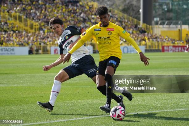 Diego of Kashiwa Reysol and Ryota Kuboni of JEF United Chiba compete for the ball during the preseason friendly match between Kashiwa Reysol and JEF...