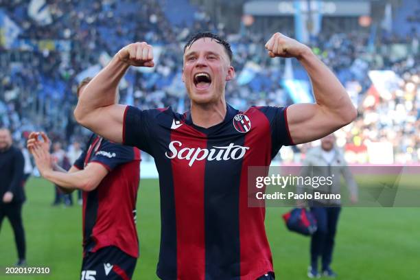 Sam Beukema of Bologna FC celebrates with the fans after the team's victory during the Serie A TIM match between SS Lazio and Bologna FC at Stadio...