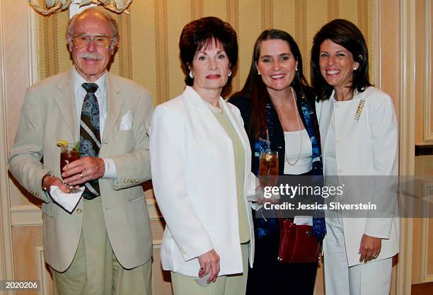 Publicist Julian Meyers, June DeMaria, Lynne Weaver and Stacy Phillips attend the Women of Los Angeles "Hope Is A Woman" luncheon at The Four Seasons...