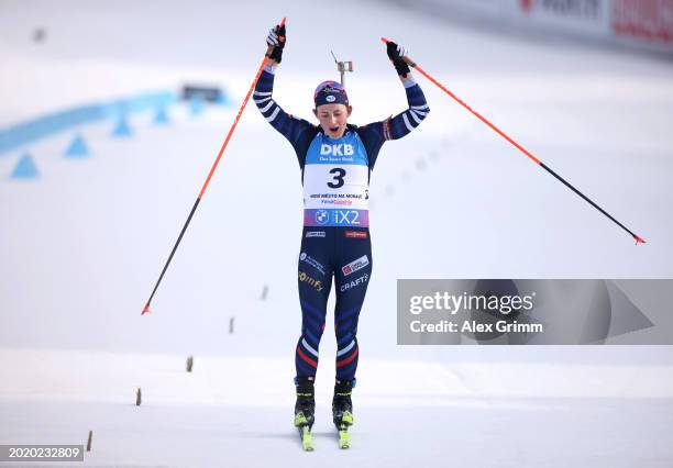 Justine Braisaz-Bouchet of France crosses the finish line to win the Women's 12.5KM Mass Start at the IBU World Championships Biathlon Nove Mesto na...