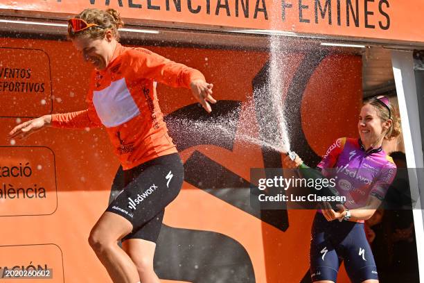 Race winner Marlen Reusser of Switzerland and Team SD Worx-Protime - Orange Leader Jersey and Niamh Fisher-Black of New Zealand and Team SD...