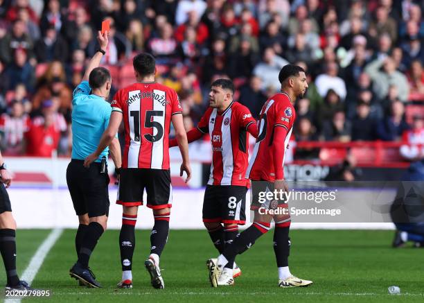 Mason Holgate of Sheffield United shown a red card during the Premier League match between Sheffield United and Brighton & Hove Albion at Bramall...