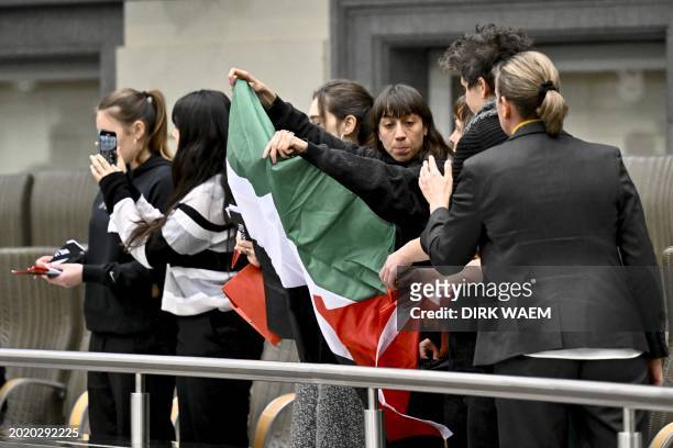 Protest in solidarity with Palestine is held during a plenary session of the Flemish Parliament in Brussels, Wednesday 21 February 2024. BELGA PHOTO...