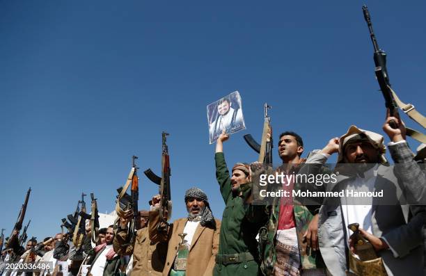 Yemen's Houthi followers chant slogans as they participate in a rally staged in solidarity with Palestinians amid the military escalating in the Red...