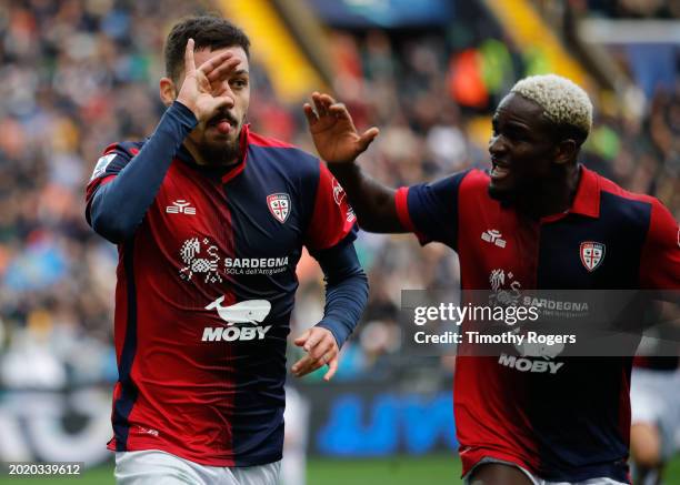 Gianluca Gaetano of Cagliari celebrates scoring a goal with teammate Zito Luvumbo during the Serie A TIM match between Udinese Calcio and Cagliari -...