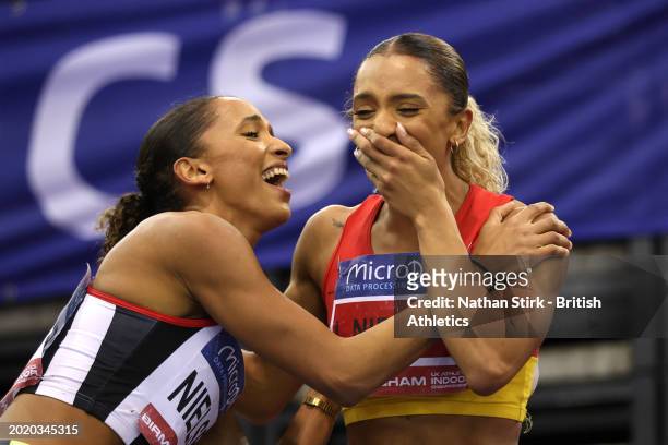 Silver medalist, Lina Nielsen , and Gold medalist, Laviai Nielsen of Great Britain celebrate following the Women's 400m Final during day two of the...