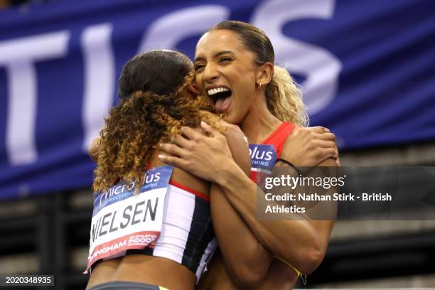 Silver medalist, Lina Nielsen , and Gold medalist, Laviai Nielsen of Great Britain celebrate following the Women's 400m Final during day two of the...