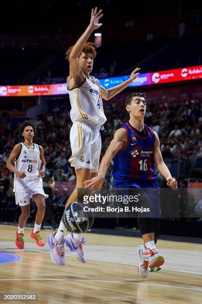 Jan Martín of FC Barcelona and Rhys Robinson of Real Madrid in action during the Finals of Mini Copa Endesa 2024 match between FC Barcelona and Real...