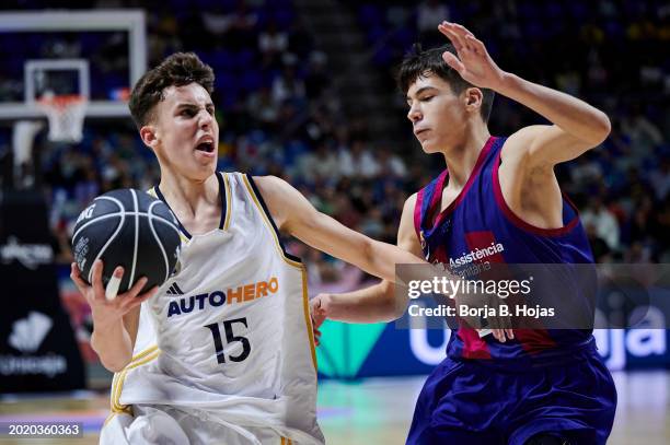 Hugo Lloscos of FC Barcelona and Pablo Mera of Real Madrid in action during the Finals of Mini Copa Endesa 2024 match between FC Barcelona and Real...