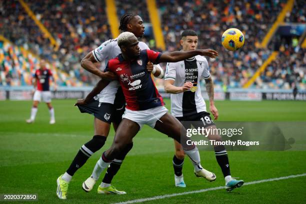 Kingsley Ehizibue of Udinese holds back Zito Luvumbo of Cagliari during the Serie A TIM match between Udinese Calcio and Cagliari - Serie A TIM at...