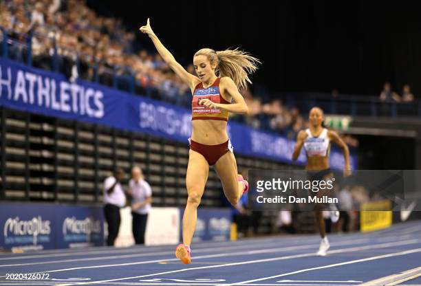 Gold medalist, Georgia Bell of Great Britain, crosses the line in the Women's 1500m Final during day two of the 2024 Microplus UK Athletics Indoor...