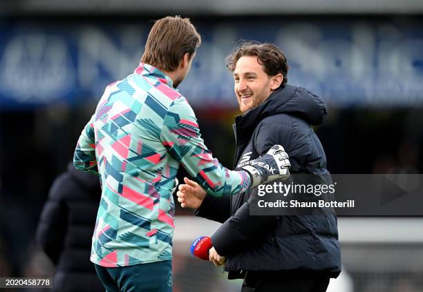 Tim Krul of Luton Town interacts with Tom Lockyer of Luton Town prior to the Premier League match between Luton Town and Manchester United at...