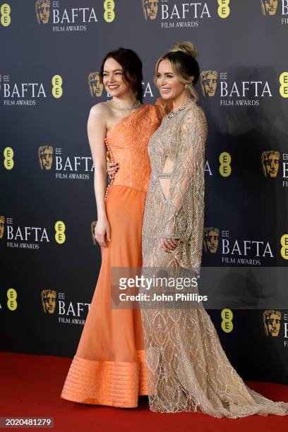 Emma Stone and Emily Blunt attend the 2024 EE BAFTA Film Awards at The Royal Festival Hall on February 18, 2024 in London, England.