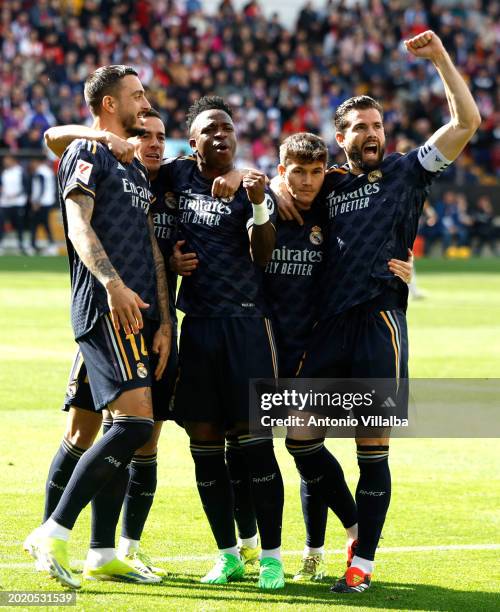 Real Madrid players celebrate after scoring a goal during the LaLiga EA Sports match between Rayo Vallecano and Real Madrid CF at Estadio de Vallecas...