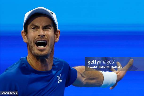 Britain's Andy Murray reacts after a point against Czech Republic's Jakub Mensik during their men's singles match at the ATP Qatar Open tennis...